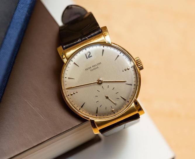 The antique Patek Philippe features a simple dial.